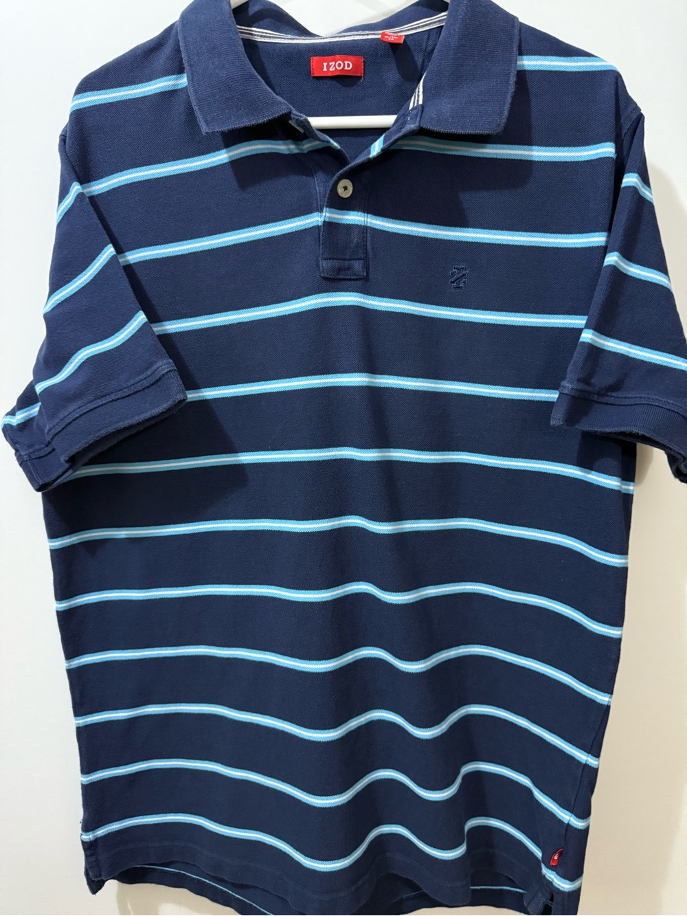 Item 061526E   
IZOD Men's Navy Polo Shirt with Light Blue Stripes
